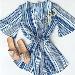 NWOT tie dye flowy deep v wrap romper. Lovely!